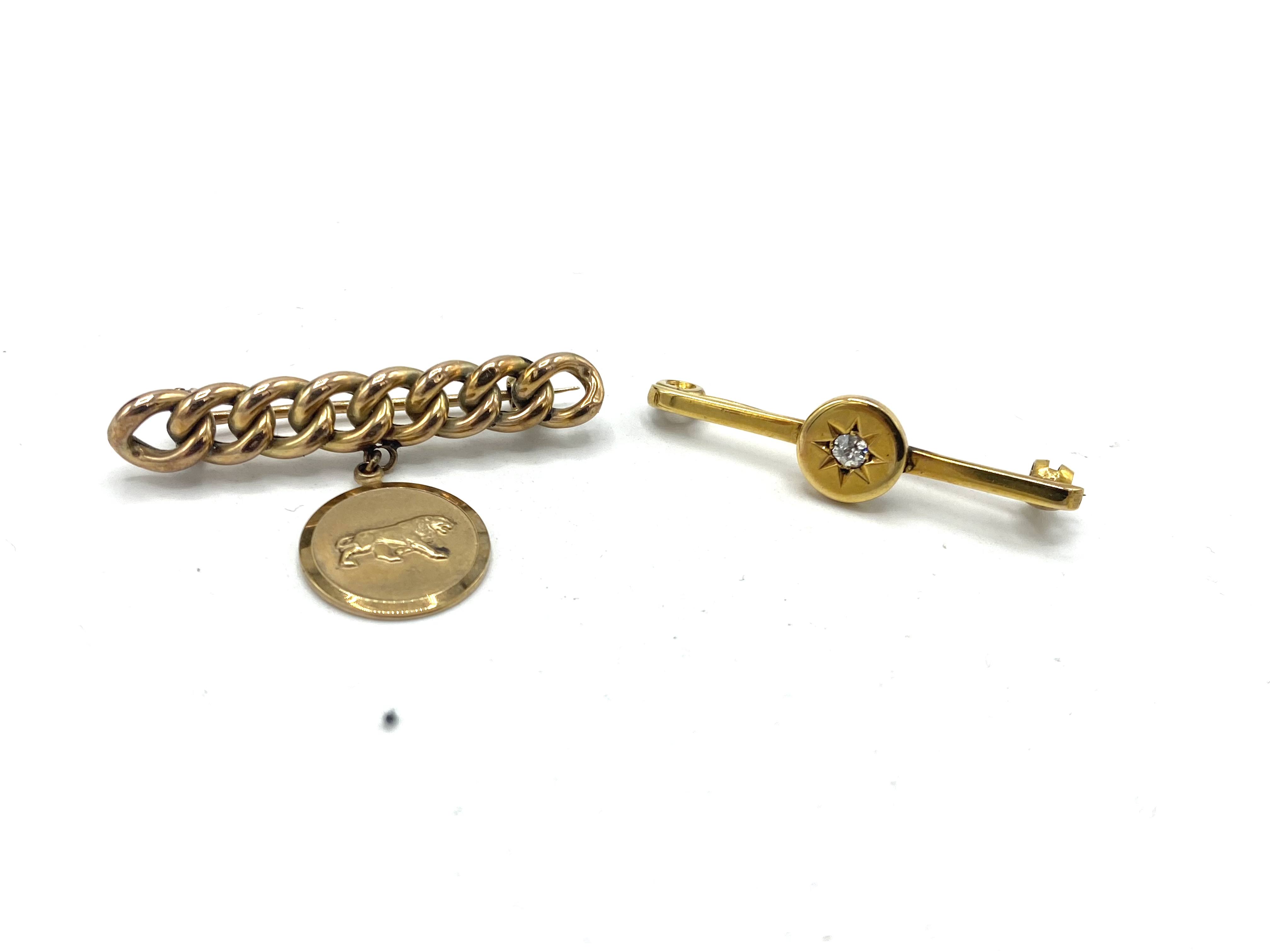 Two gold bar brooches
