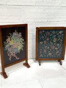 Two oak framed fire screens with tapestry decoration behind perspex.