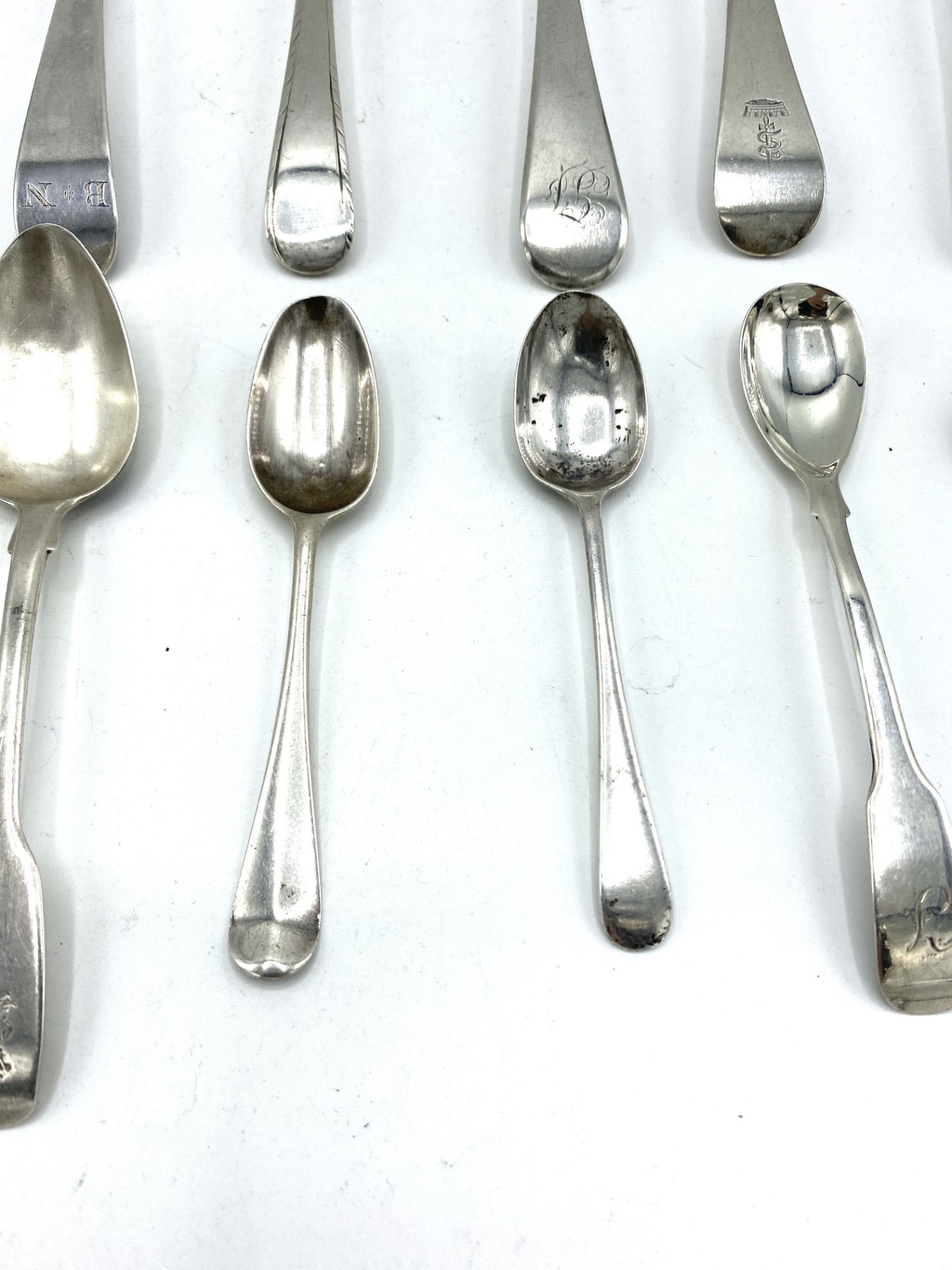 Six Georgian silver table spoons and six silver tea and cruet spoons - Image 5 of 6