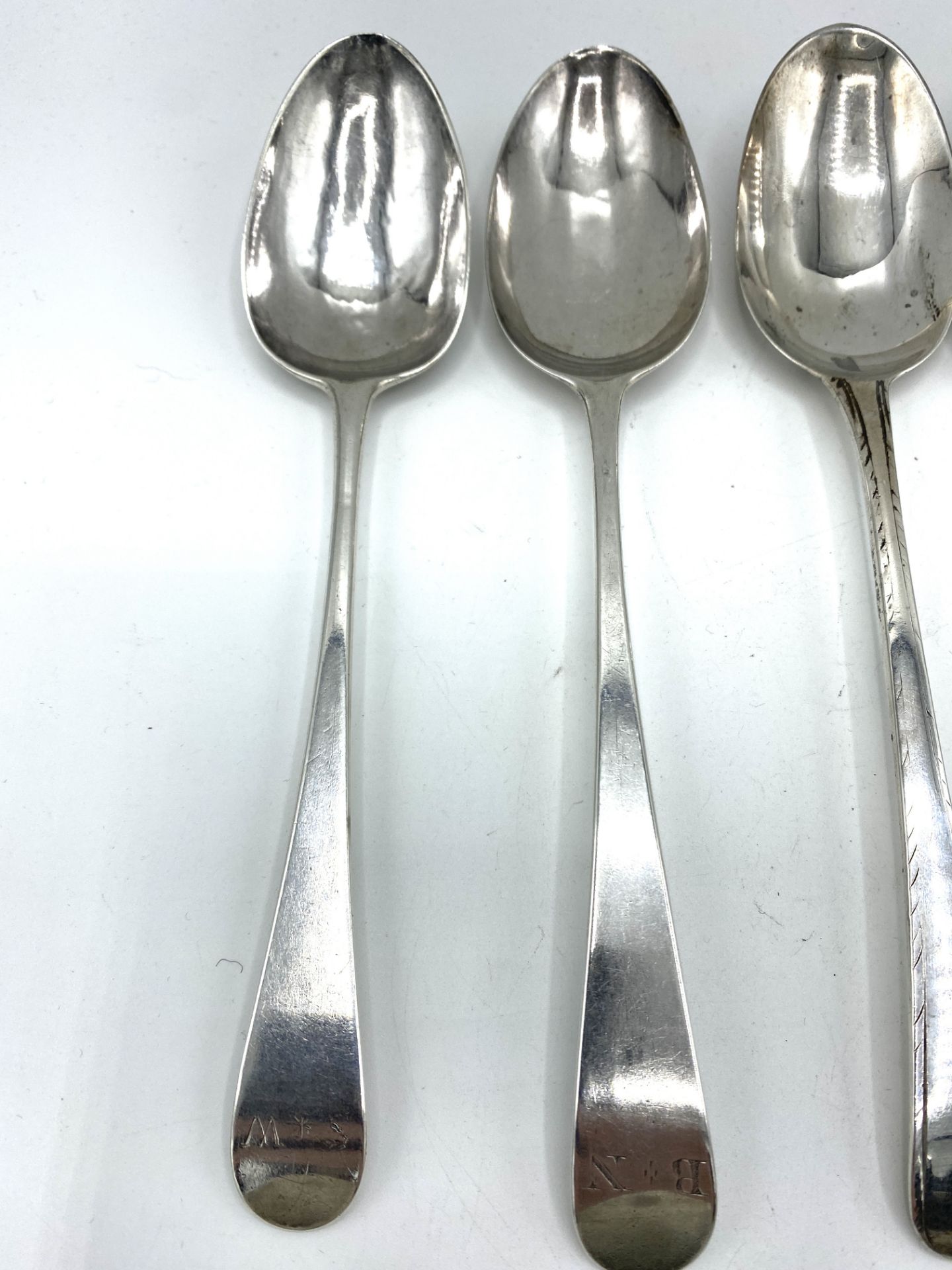 Six Georgian silver table spoons and six silver tea and cruet spoons - Image 2 of 6