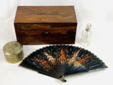 Rosewood tea caddy, a fan, white metal pot and small decanter