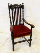 Oak frame rail back arm chair with rush seat