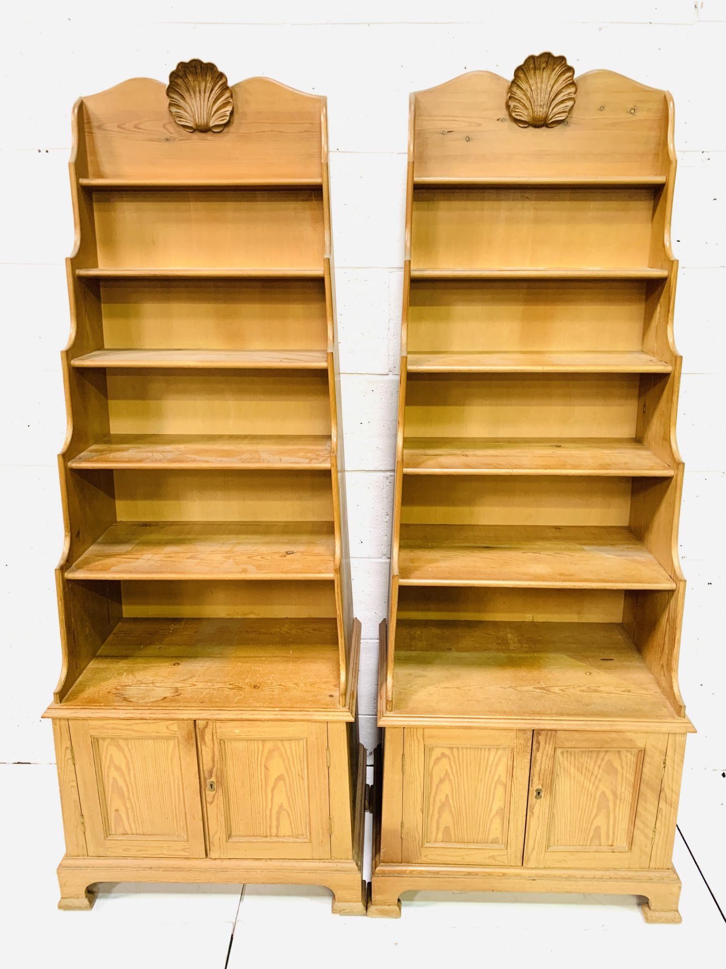 Pair of pine waterfall display shelves