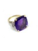 18ct gold ring set with diamonds and an amethyst