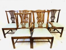 Five mahogany dining chairs with matching carver