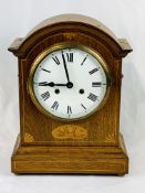 Mahogany mantel clock together with a wood cased mantel clock