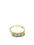 18ct gold five stone ring, set with opals and diamonds