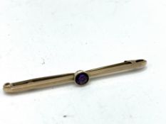 9ct gold bar brooch set with an amethyst