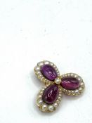 Gold brooch with amethyst drops and seed pearls