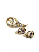 Gold brooch set with sapphires with matching earrings