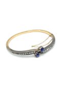 Gold bangle set with diamonds and sapphires