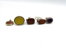 Five various yellow metal and polished stone fob seals