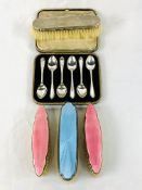 Six silver teaspoons in original box, together with four silver backed brushes