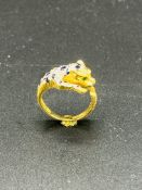 Yellow metal ring in the form of a leaping leopard