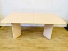 Italian plastic coated extending dining table with six matching chairs