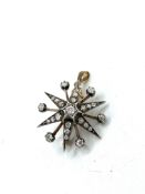 Gold and platinum diamond set star shaped pendant cum brooch