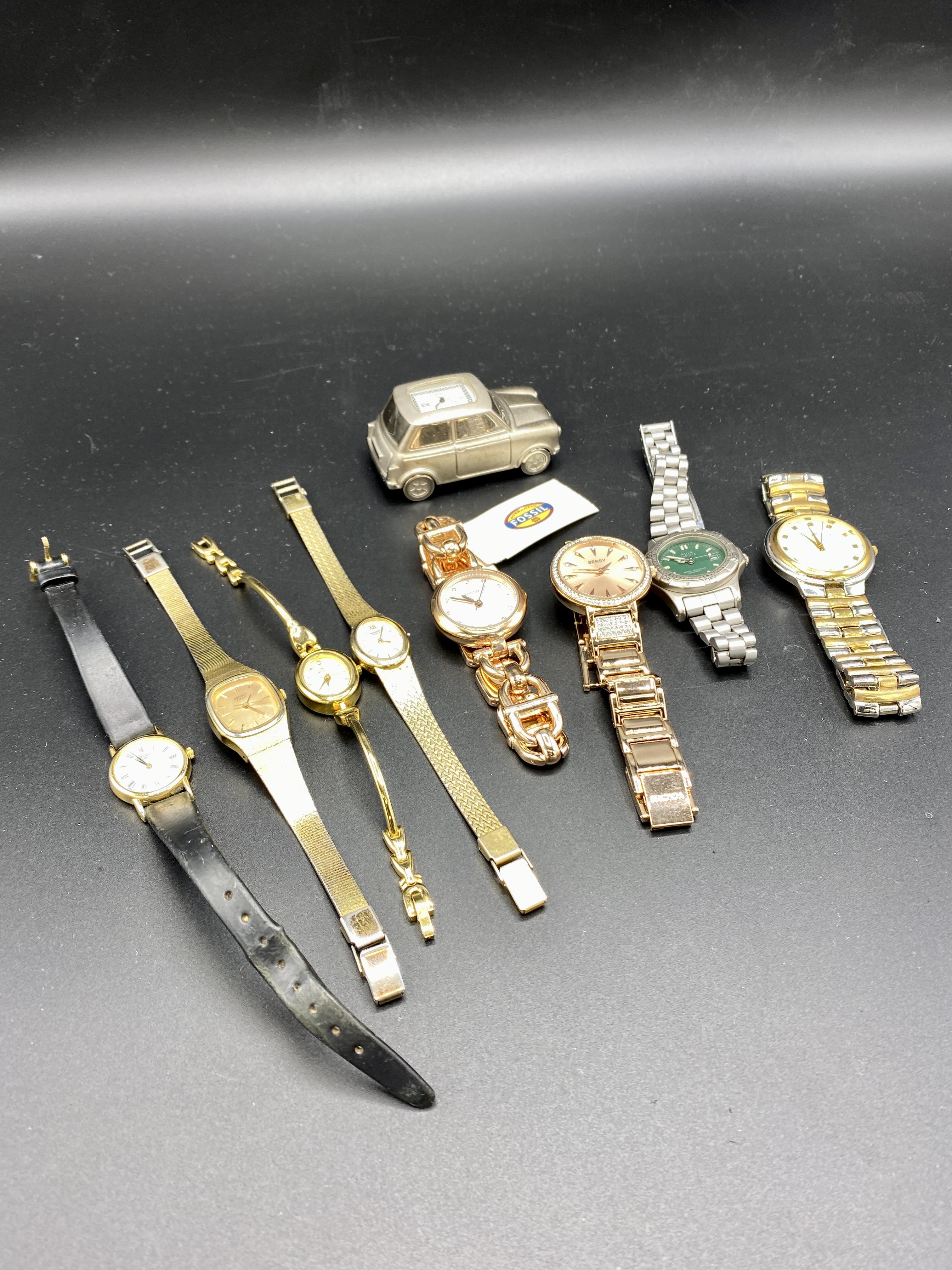 A collection of fashion watches