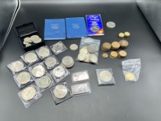 Two one ounce pure silver .999 fine ingots, and a collection of coins some silver