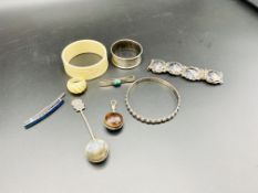A quantity of silver jewellery and other items