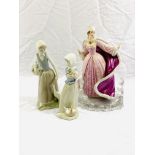 A Lladro figure together with two others