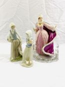 A Lladro figure together with two others