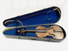 A violin in fitted wooden case