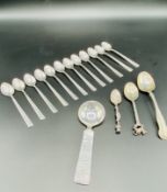 Set of twelve Swedish silver coffee spoons and other silver spoons