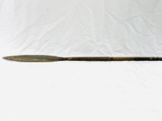 A metal tipped wood spear