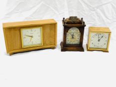 Three wood cased mantel clocks