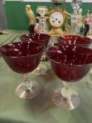 Two glass decanters and four drinking glasses