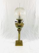 A brass oil lamp converted for electricity