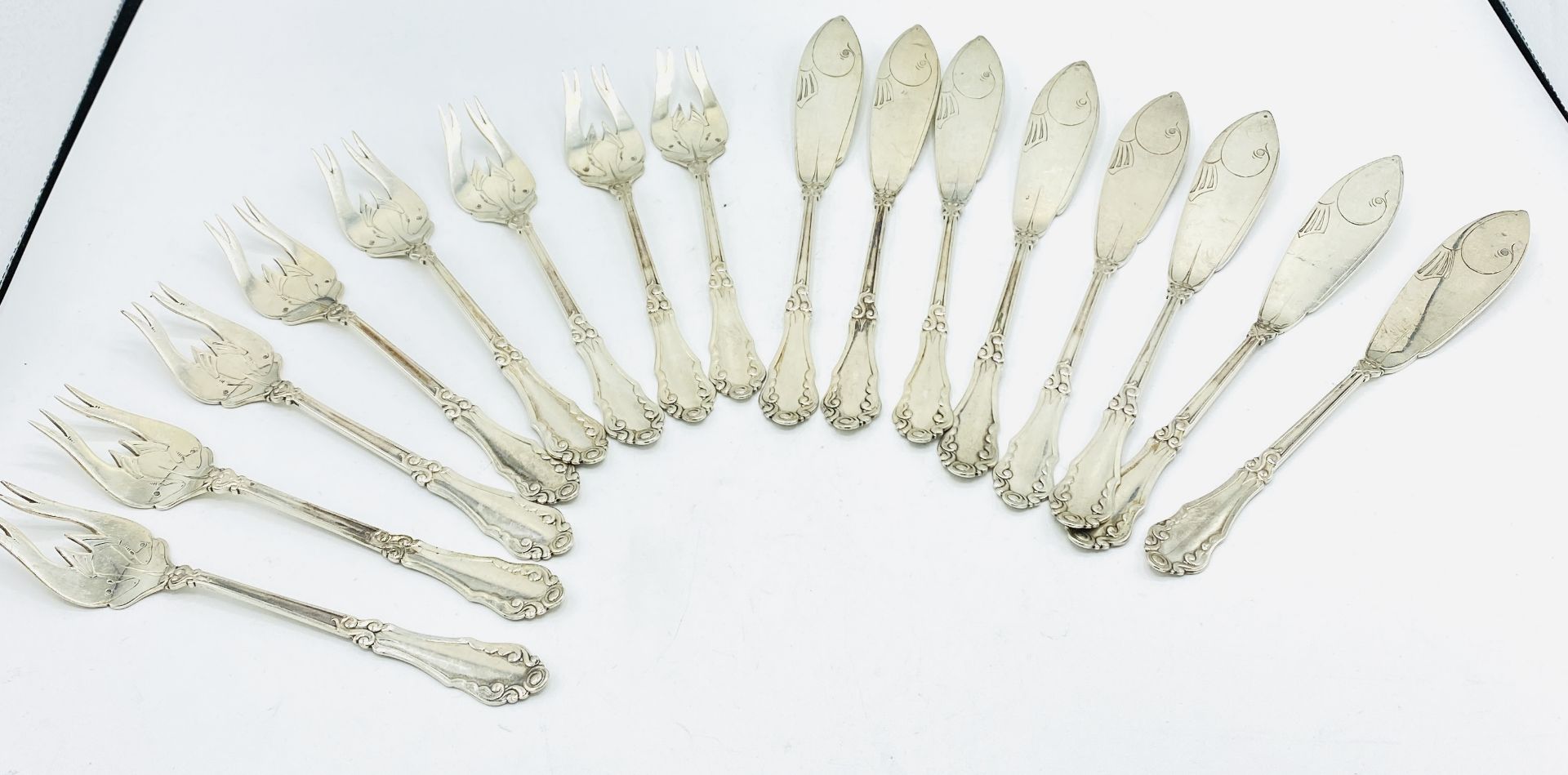 8 piece silver fish cutlery setting by Peter Hertz Of Denmark