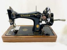 Singer sewing machine in box