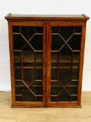 Mahogany glass fronted wall mounted bookcase