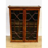 Mahogany glass fronted wall mounted bookcase