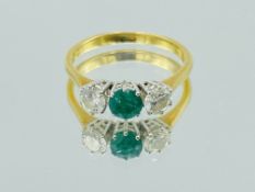 Gold, emerald and diamond ring