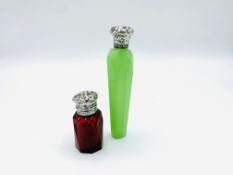 Faceted lime green glass scent flask and a faceted red glass scent bottle