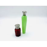 Faceted lime green glass scent flask and a faceted red glass scent bottle