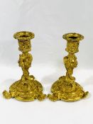 A pair of ormolu candlesticks