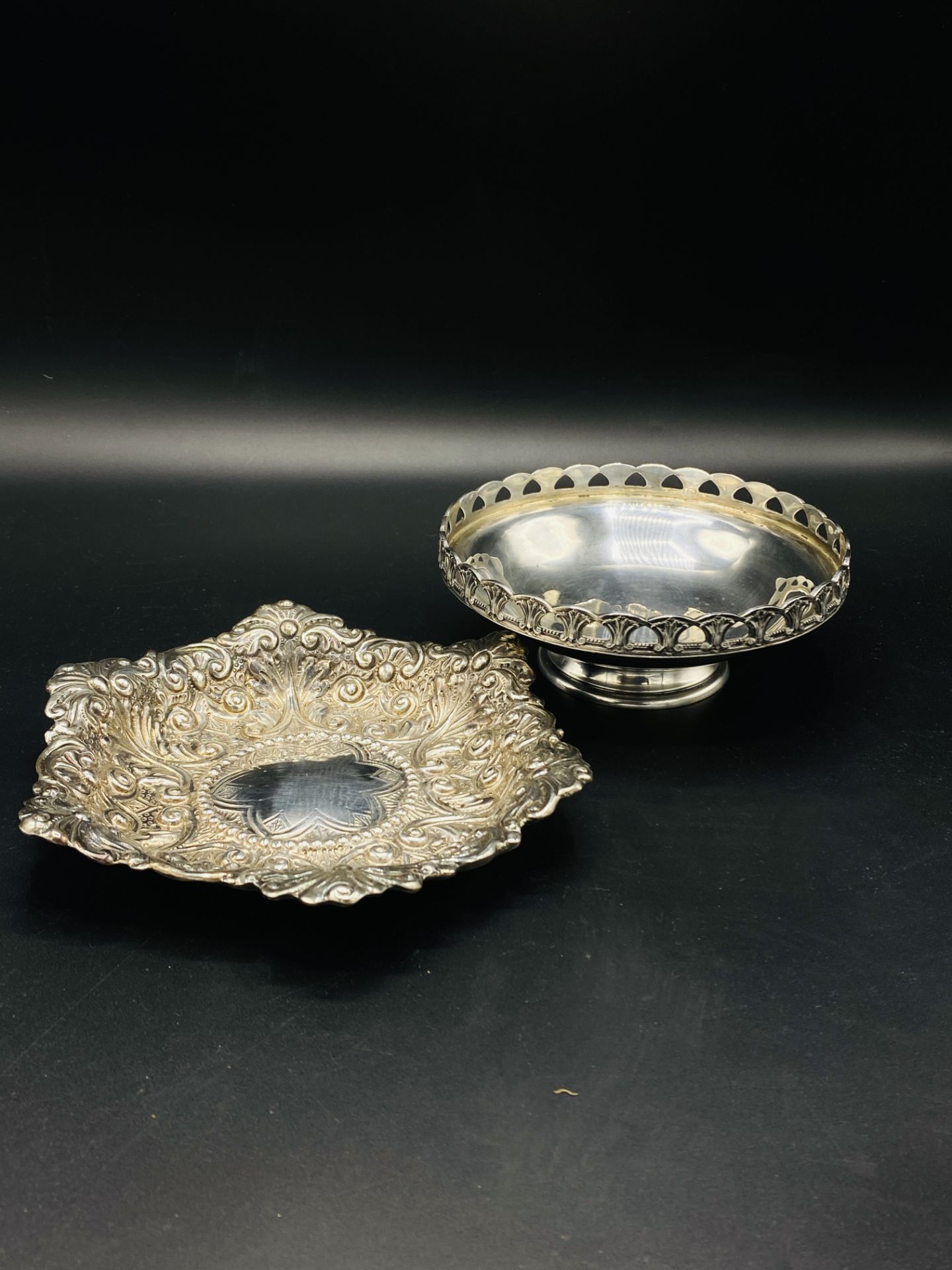 Late Victorian silver repousse decorated dish, and another silver dish