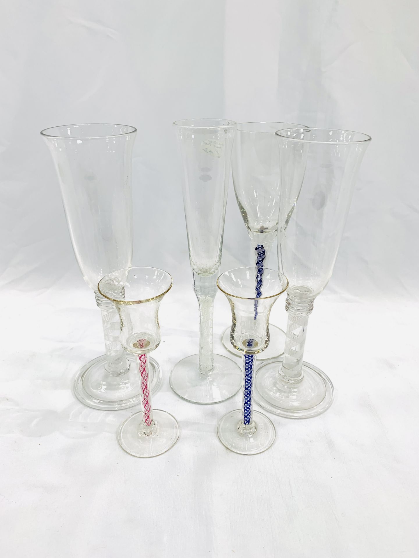 Six wine glasses with air twist stems