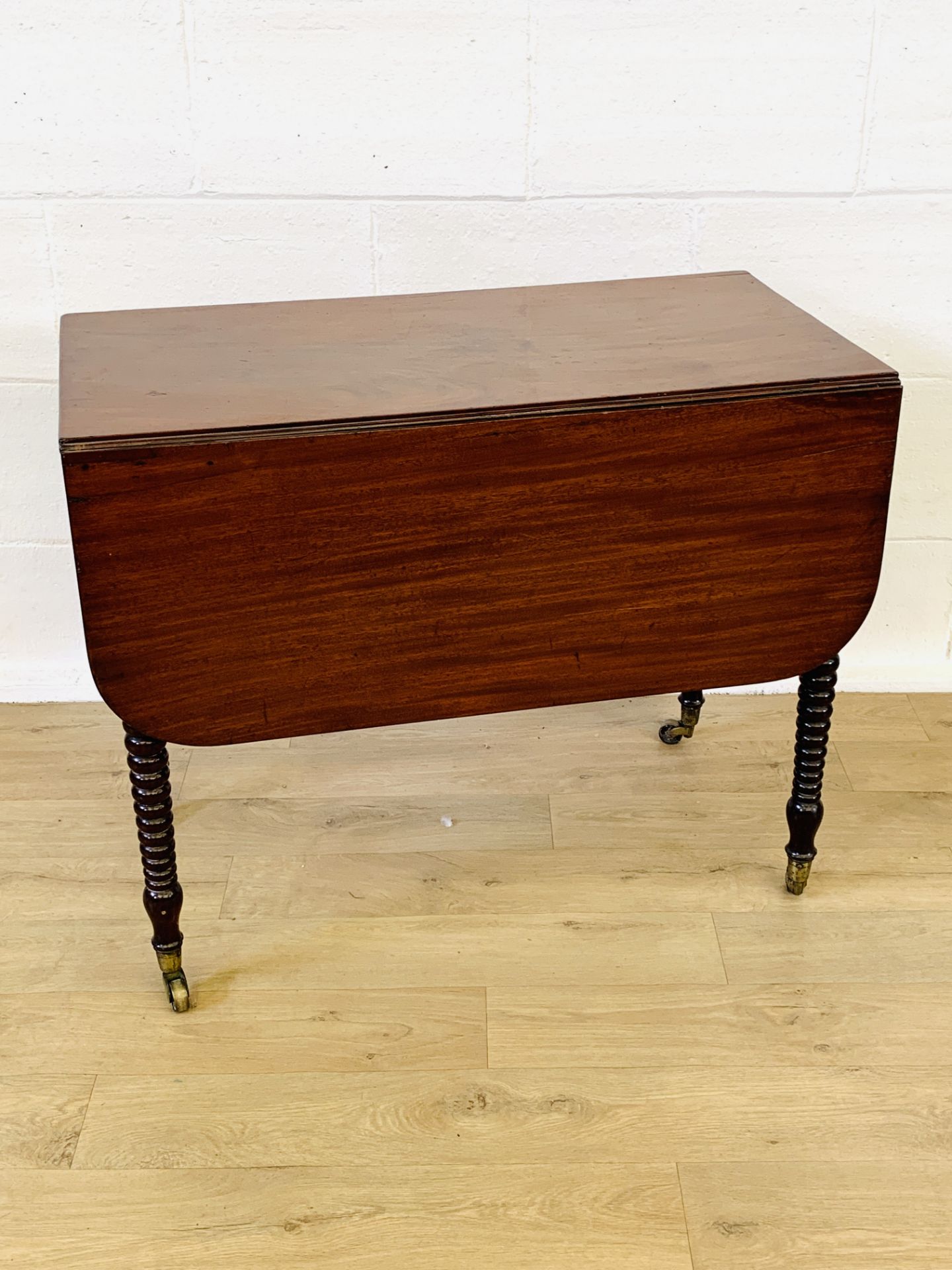 Mahogany drop side table with side drawer
