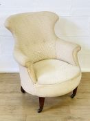 Cream upholstered button back bedroom armchair