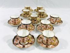 A collection of Royal Crown Derby cups and saucers