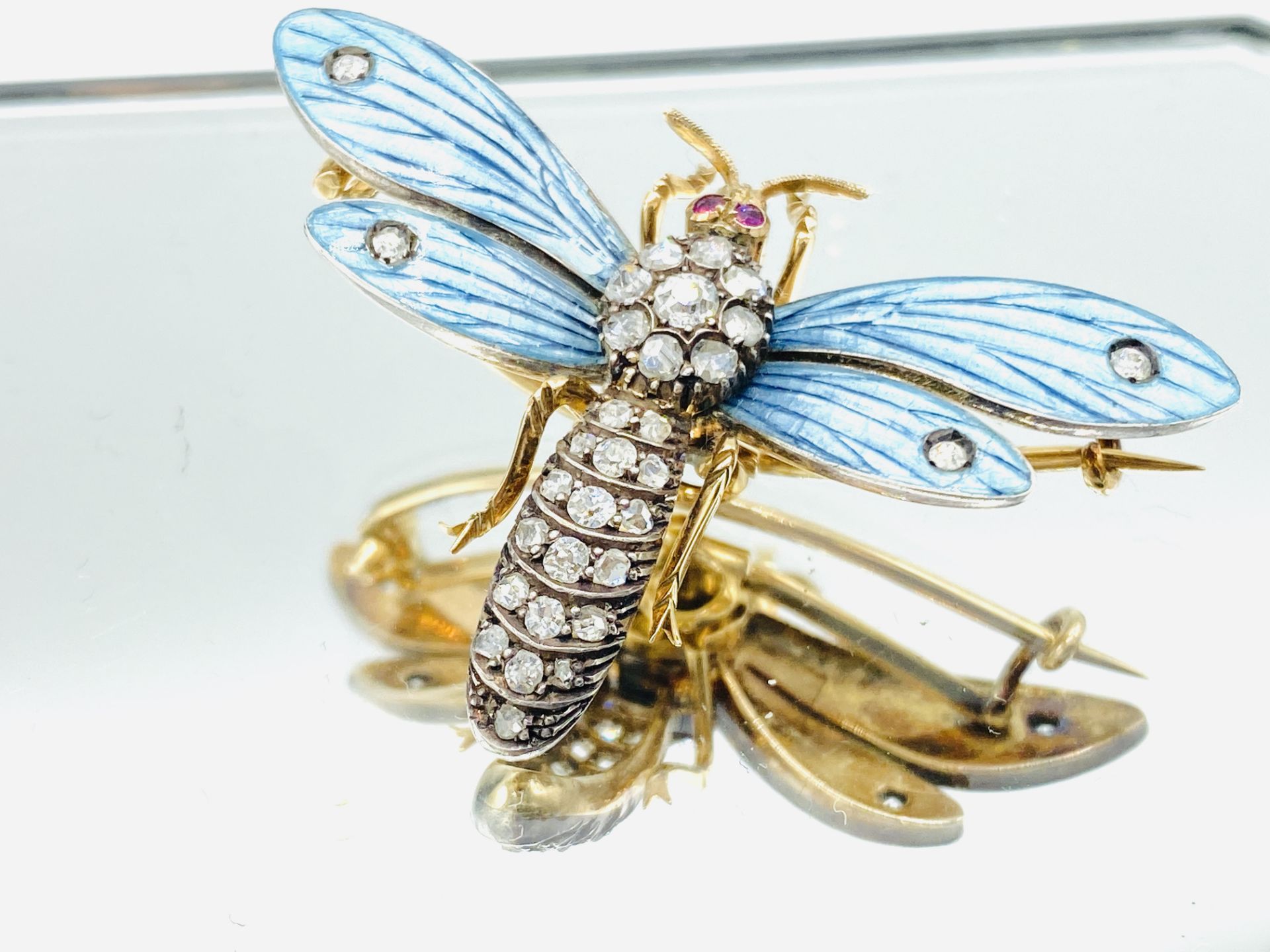 Gold insect brooch