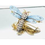 Gold insect brooch