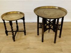 Two brass topped folding tables