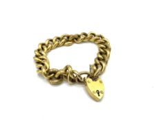 Gold curb and padlock bracelet