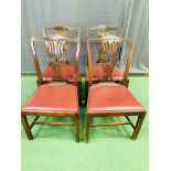 A set of four mahogany dining chairs