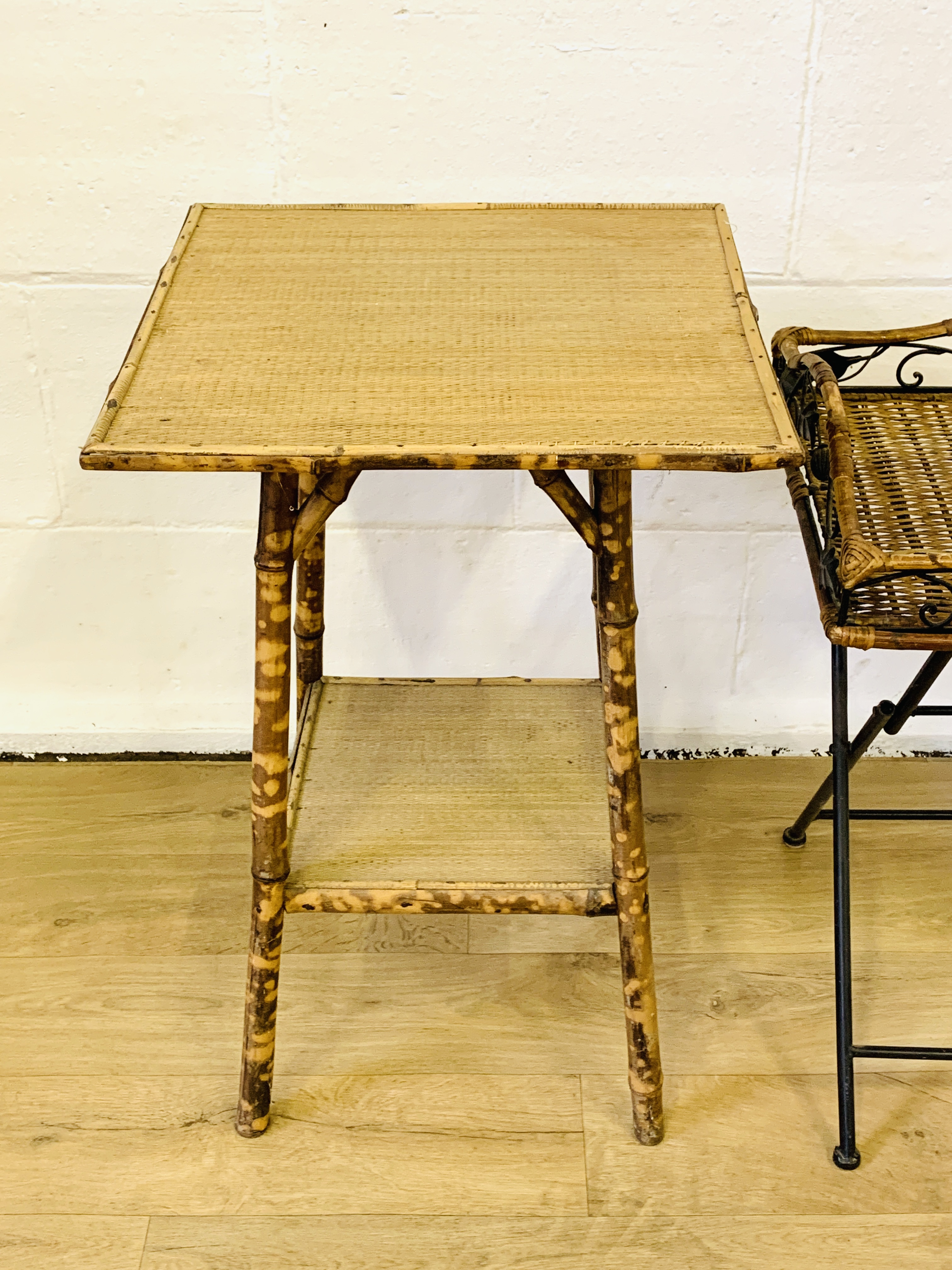 A bamboo side table and a folding metal table with wicker top - Image 3 of 4